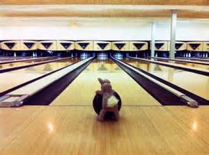 A young bowler enjoying the wooden lanes at Fireside